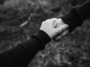 Comforting hand on a shoulder
